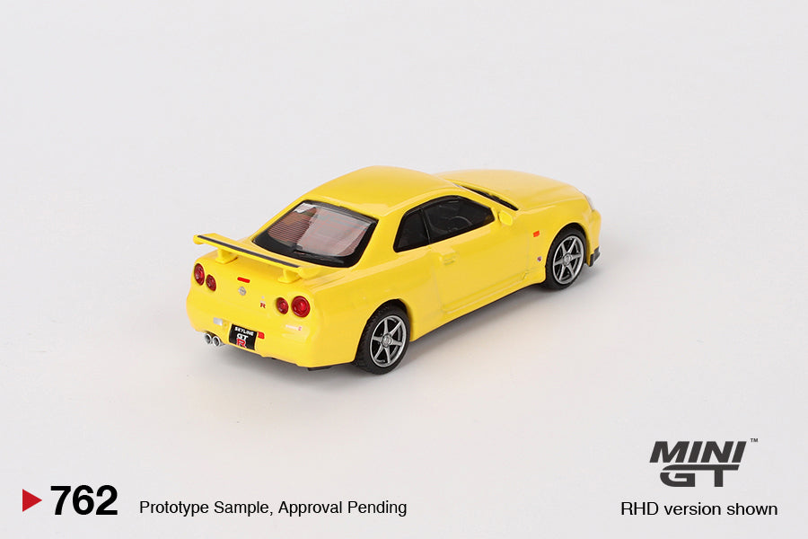 (COMING SOON) MINI GT 1/64 Nissan Skyline GT-R (R34) V-Spec – Lightning Yellow- MiJo Exclusives