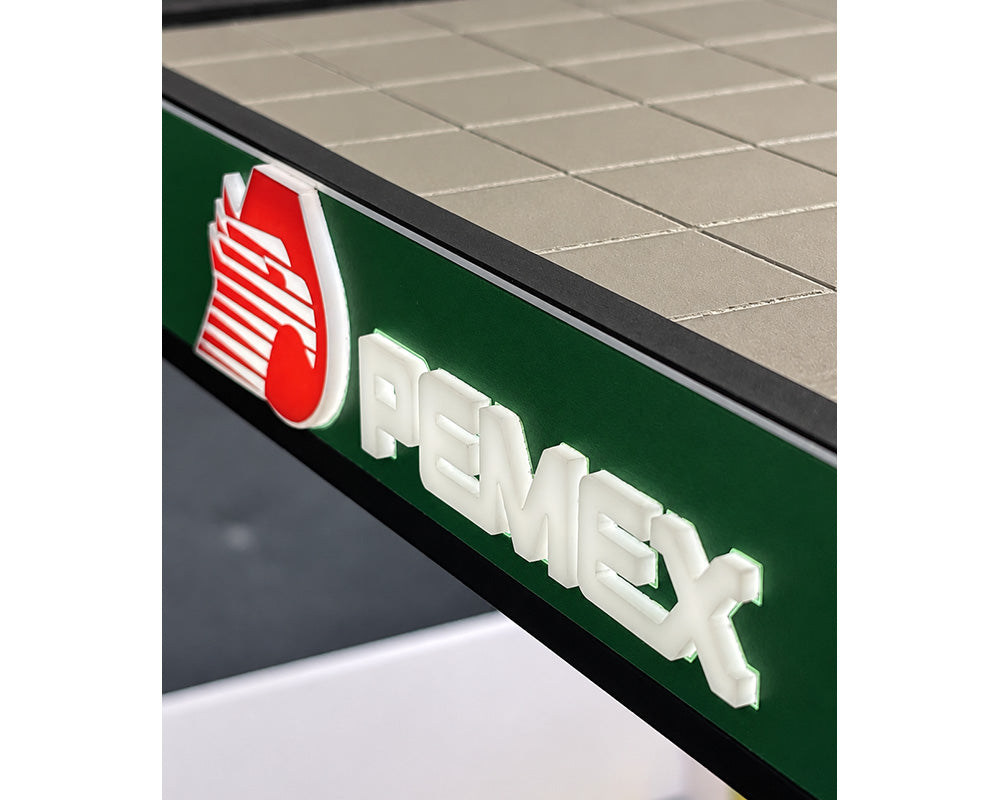 (COMING SOON) AMERICAN DIORAMA 1:64 PEMEX Gas Station Illuminated LED Diorama (11.2″L x 11.8″W x 4.85″H)