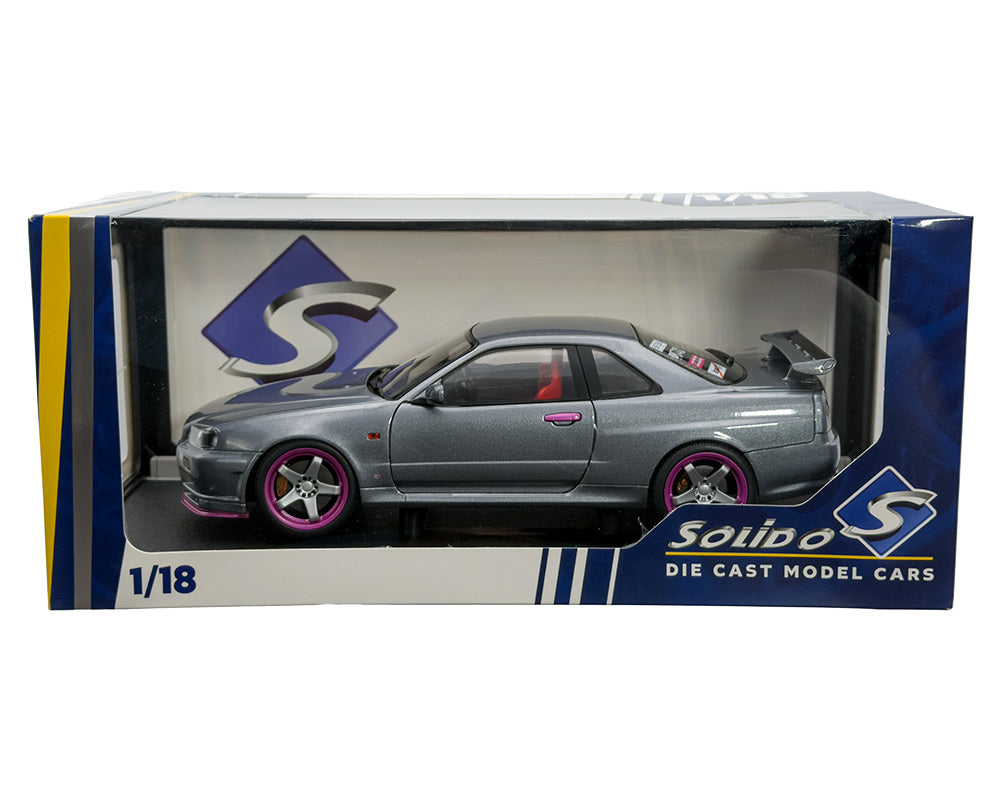 Solido 1:18 1999 Nissan Skyline GT-R R34 – Silver with Purple Metallic Accents